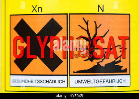 Etichetta di avvertimento con erbicida con Glyphosat, Warnlabel bei Unkrautvernichtungsmittel mit Glyphosat Foto Stock