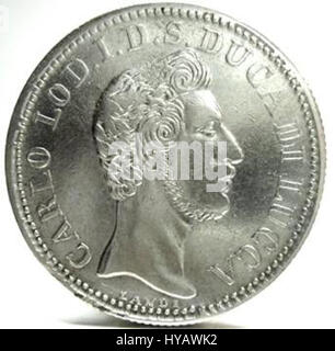 "2 lire di Lucca testa" si riferisce alla moneta coniata nella città di Lucca, Italia, durante un periodo storico. Rappresenta un importante artefatto della numismatica italiana, che riflette la storia economica e culturale di Lucca in epoca medievale. Foto Stock