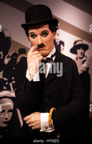 Cera figura di Sir Charles Spencer Charlie Chaplin, inglese attore comico nel museo delle cere di Madame Tussauds di Amsterdam, Paesi Bassi Foto Stock