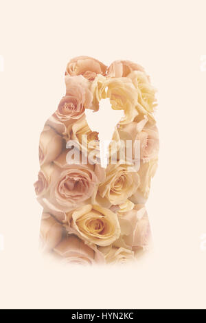 La doppia esposizione ritratto di un matrimonio giovane combinato con rose dal bouquet di nozze Foto Stock