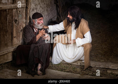 Gesù che guarisce gli storpi o storpi uomo Foto Stock