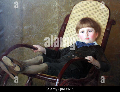 Questo titolo si riferisce a una fotografia o a un dipinto di Erwin Nöbbe da bambino su una sedia a dondolo, scattata nel 1887. L'immagine cattura un tenero momento dell'infanzia, mostrando una scena semplice e intima. Foto Stock