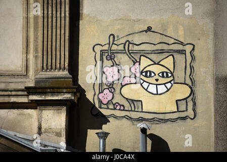 M. Chat graffiti da Thoma Vuille, rue Bonaparte, Ecole des Beaux Arts, su vecchi tetti di Parigi e il camino, Parigi, Francia, Europa Foto Stock