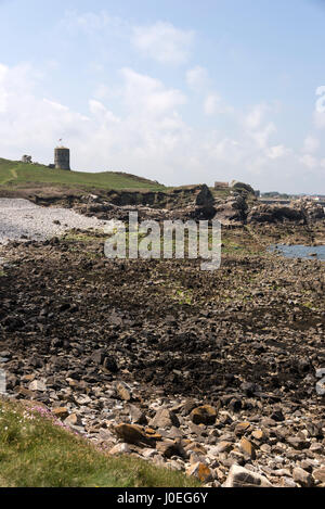 L'Ancresse scappatoia torre presso l'Ancresse baia sulla costa nord dell'isola di Guernsey nelle isole della Manica e la Gran Bretagna Foto Stock