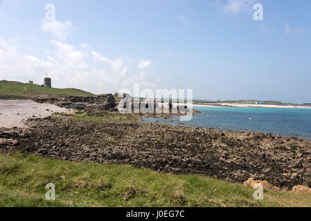 L'Ancresse scappatoia torre presso l'Ancresse baia sulla costa nord dell'isola di Guernsey nelle isole della Manica e la Gran Bretagna Foto Stock
