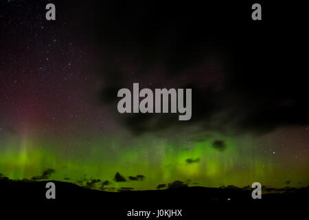 Aurora Boreale visto dalla A82 attraverso Rannoch Moor, Highlands Scozzesi. Foto Stock