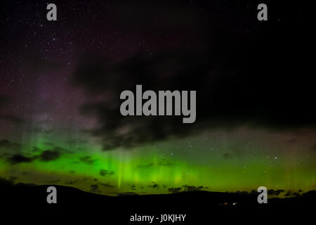 Aurora Boreale visto dalla A82 attraverso Rannoch Moor, Highlands Scozzesi. Foto Stock