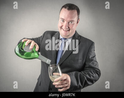 Imprenditore di bere alcool Foto Stock