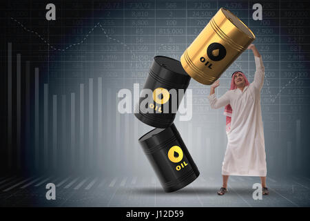 Imprenditore arabo holding barile di petrolio Foto Stock