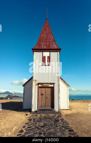 La chiesa collinare in Hellnar, un villaggio di pescatori situato sulla penisola di Snaefellsnes, western Islanda Foto Stock