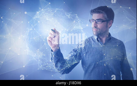 Imprenditore toccando le sfere collegate Foto Stock