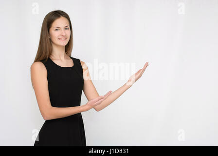 Business donna presentando un copyspace. Foto Stock