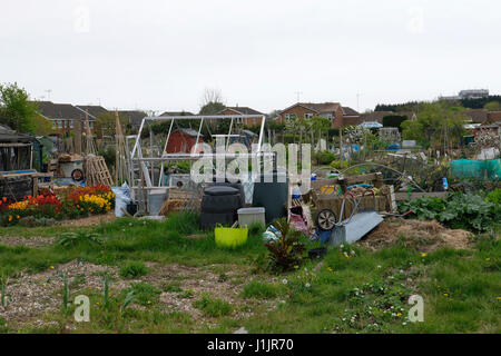 Sussex, Regno Unito. Confuso disordinato il riparto trama riempiti con i rifiuti e i detriti Foto Stock