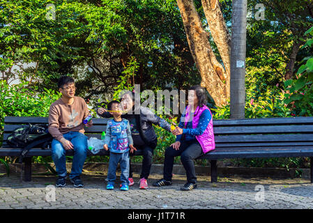 Gruppo familiare, Hong Kong Park, Hong Kong Foto Stock