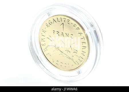 Oro speciale problema del francese di 1 franco coin isolati su sfondo bianco Foto Stock