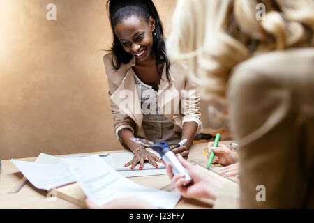 Creative group of people designing and working in workshop Foto Stock
