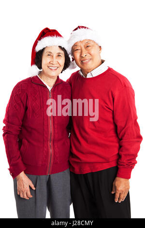 Un colpo di senior coppia asiatica di celebrare il Natale Foto Stock