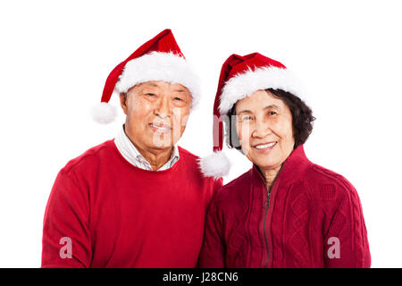 Un colpo di senior coppia asiatica di celebrare il Natale Foto Stock