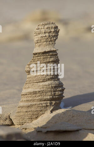 Le figure nella sabbia sulla spiaggia. Foto Stock