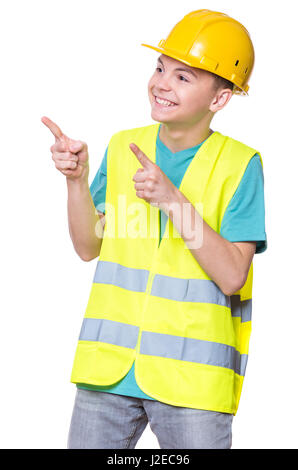 Ragazzo che indossa casco giallo Foto Stock