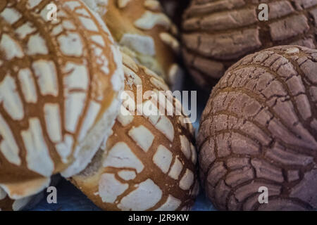 Conchas (messicano pane dolce) per la vendita su un mercato Foto Stock