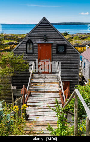 Un pesce shack in blu le rocce, Nova Scotia, Canada. Foto Stock