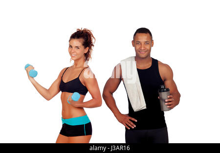 Athletic uomo dopo facendo esercizi tenendo un asciugamano e proteina di shaker per cocktail e slim formazione ragazza Foto Stock