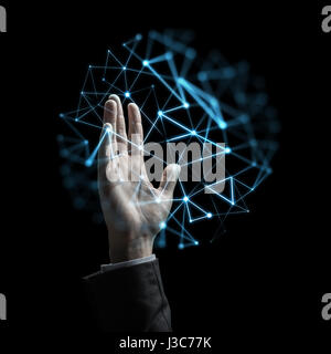 Imprenditore con mano virtuale proiezione di rete Foto Stock