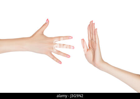 Due mani femminili mostrano i simboli sulle unghie chiodo. Foto Stock