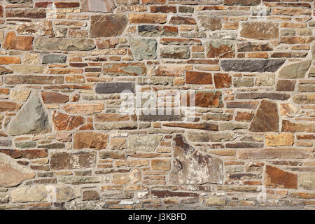 Muro di pietra naturale per uso in background Foto Stock