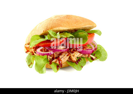 Sandwish con estratto di carne di maiale, insalata di pomodoro e su bianco Foto Stock