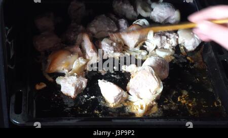 I deliziosi pezzi di carne in forno. Foto Stock