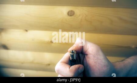 Mano tenta alla luce il più leggero movimento lento. Foto Stock