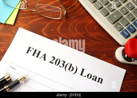 FHA 203b politica di prestito in un ufficio. Foto Stock