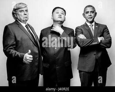 Presidente Donald Trump J, il Presidente Barack Obama e il leader supremo della Corea del nord Kim Jong-Un lookalikes soddisfare per un servizio fotografico di Hong Kong. Foto Stock