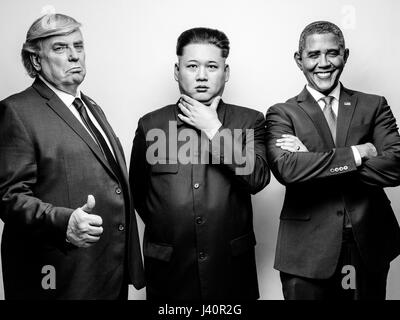 Presidente Donald Trump J, il Presidente Barack Obama e il leader supremo della Corea del nord Kim Jong-Un lookalikes soddisfare per un servizio fotografico di Hong Kong. Foto Stock