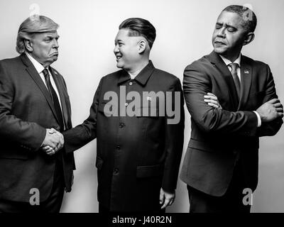 Presidente Donald Trump J, il Presidente Barack Obama e il leader supremo della Corea del nord Kim Jong-Un lookalikes soddisfare per un servizio fotografico di Hong Kong. Foto Stock