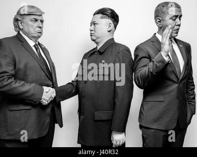 Presidente Donald Trump J, il Presidente Barack Obama e il leader supremo della Corea del nord Kim Jong-Un lookalikes soddisfare per un servizio fotografico di Hong Kong. Foto Stock