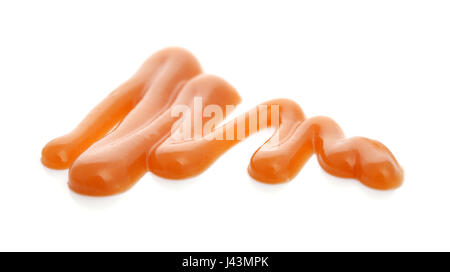 Dolce la salsa di caramello isolato su uno sfondo bianco Foto Stock