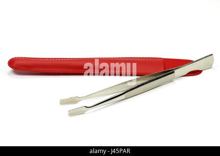 Pinzette di timbro isolato su sfondo bianco Foto Stock