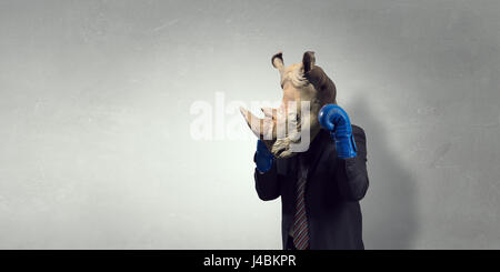 Rhino vestito in business suit Foto Stock