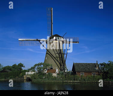 I Paesi Bassi, Kinderdijk, mulino a vento, flusso fuori, estate, vicino a Rotterdam, Olanda, mill, mulini, mulino a vento, scenario, luogo di interesse, luoghi di interesse, l'UNESCO-patrimonio culturale mondiale, 'bambini dyke', casa in legno, il Summer House Foto Stock