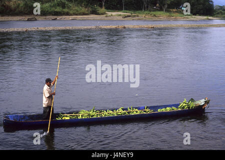 Costa Rica, Bribri, uomo, barca, banane, trasporti, Foto Stock