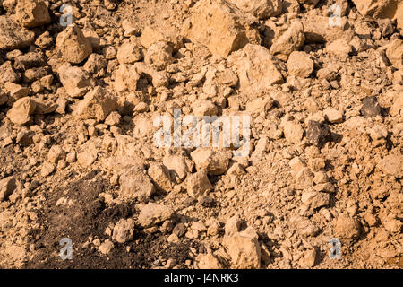 Di argilla e sabbia nella cava. Bellissimo sfondo insolito simile alla superficie del pianeta Marte o la luna Foto Stock