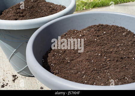 Impianto contenitori contenenti soi di incapsulazione Foto Stock