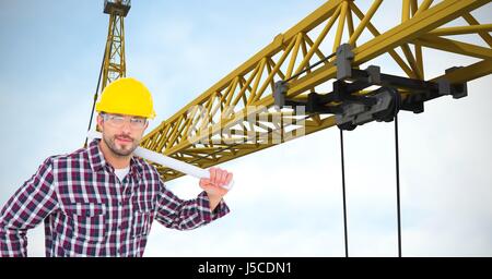 Composito Digitale di fiduciosa architetto azienda blueprint mediante gru Foto Stock