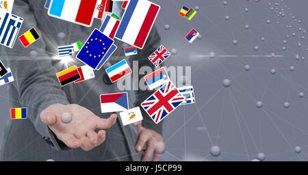 Composito Digitale della sezione mediana della persona d'affari con vari flag Foto Stock