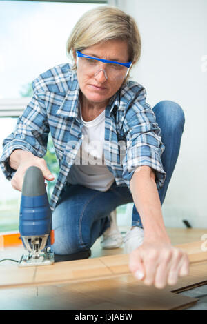 Femmina lavoratore di costruzione Foto Stock