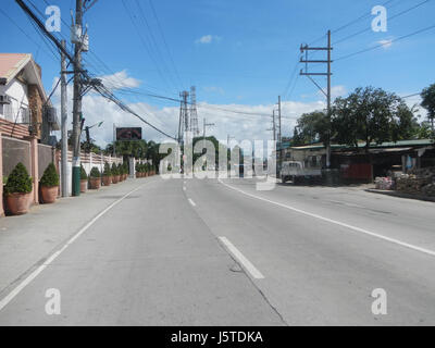 Questo riferimento evidenzia una posizione lungo la MacArthur Highway a Bulacan, nelle Filippine, in particolare a Malolos, Guiguinto e Balagtas. Fornisce informazioni sui motel in queste aree, pertinenti per comprendere il settore ricettivo locale. Foto Stock
