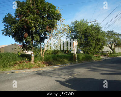 Il Metrogate Meycauayan II Heritage Homes del 01416 è un progetto di sviluppo residenziale situato a Loma de Gato, Marilao, Bulacan. Presenta moderne unità abitative e servizi nella regione di Bulacan, Filippine. Foto Stock